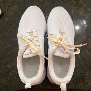 Nike Sleek White Women's Sneakers with Orange Accents